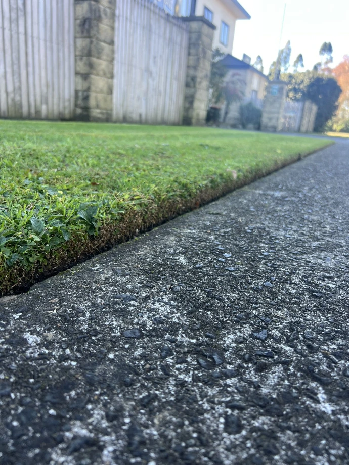 Clean lawn edging completed by Mowit4you